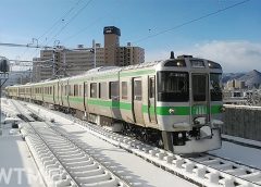 学園都市線八軒駅に到着するJR北海道721系電車(さっぽろっこ/写真AC)